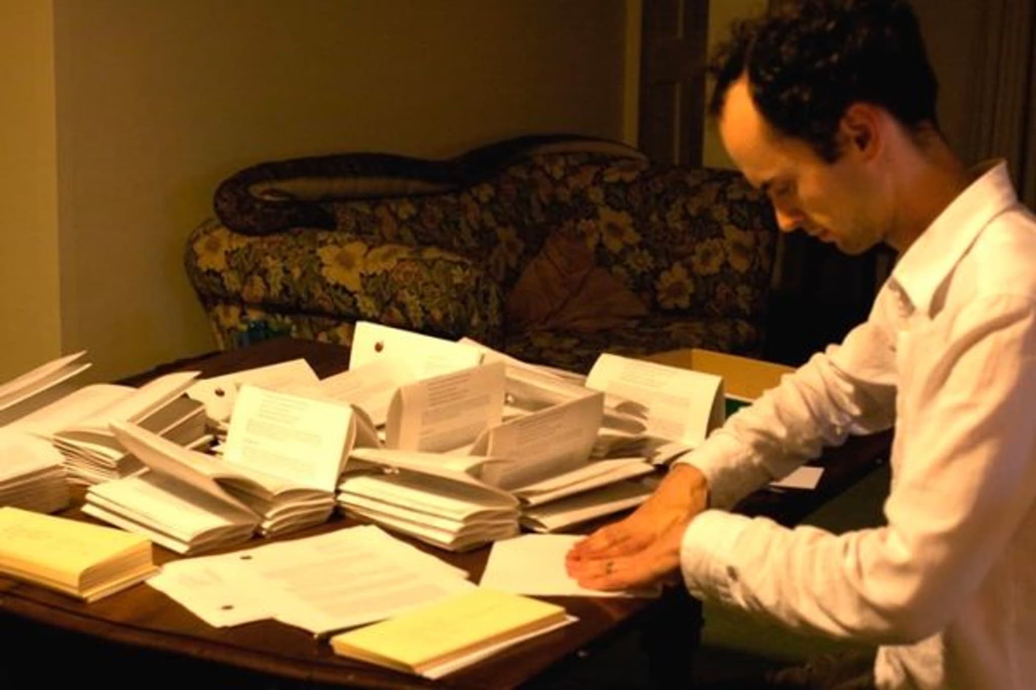 Toby Ord signing letters to new pledgers